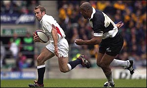 James Simpson-Daniel outpaces Jonah Lomu