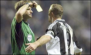 Referee Graham Barber books Newcastle skipper Alan Shearer for dissent 