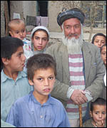 Gulam Sakhi, 83, with his grandchildren