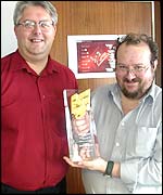 Russell Merryman (R) and Cliff Wootton (L) accept the award