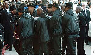 Pallbearers carrying the casket of Jam Master Jay