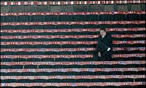 A lone fan watches the action unfold at Selhurst Park