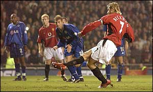 Manchester United midfielder David Beckham scores his side's first goal 