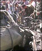 Wreckage of a car after an Israeli air raid in Gaza