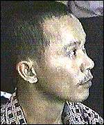 Television footage of a man said to resemble a sketch of one of the suspects