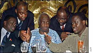 (l-r) Ivory Coast's lead negotiator Laurent Dona Fologo, Togolese Ministers Koffi Panou and Assani Tidjani, Ecowas' Roger Laloupo and rebel leader Guillaume Soro