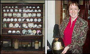 Dinnerware in the kitchen and a feathered helmet