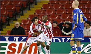 Sheffield United win in style, scoring two goals in the dying minutes to put Leeds out