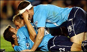 Sunderland players celebrate their victory over Arsenal