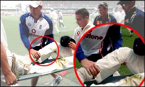 Simon Jones leaves the field on a stretcher after suffering a serious knee injury in the opening Test 