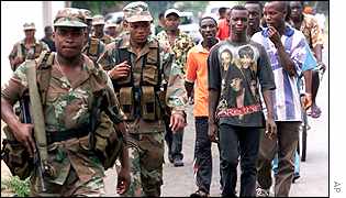 South African peacekeepers with refugees