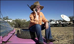 Rural satellite phone user