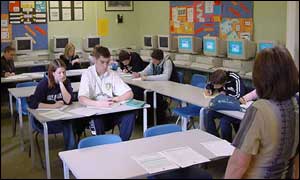 Teacher and pupils at Bushy Mead school