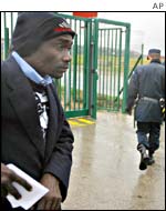 An illegal Sudanese immigrant at the closed gates of Sangatte 