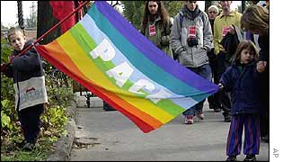 Children carrying a banner