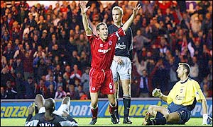 Gareth Southgate celebrates as Liverpool's Jimmy Traore, Sami Hyypia and Jerzy Dudek despair