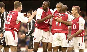 Sylvain Wiltord's 24th minute goal proves to be the winner as Arsenal close the gap on title rivals Liverpool