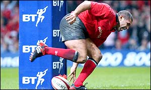 Wales captain Colin Charvis touches down to score against Fiji