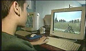 Boy playing computer game