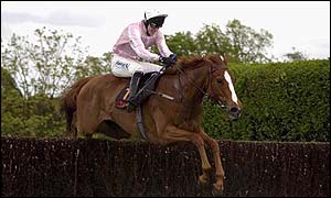 Tony McCoy steers Bounce Back to victory in the 2002 Attheraces Gold Cup at Sandown
