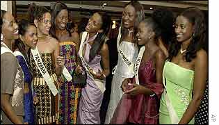 Miss Nigeria Chinenye Ivy Ochuba (centre) with other contestants at a Gala in London on November 10 