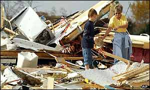 Residents inspect the remains of their neighbours' home, in Clarksville, Tennessee