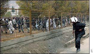 Students fleeing police officer