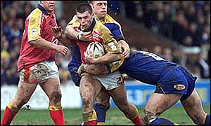 Neil Budworth takes on the Leeds defence