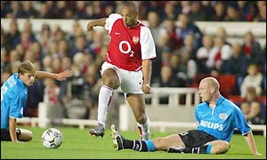 Thierry Henry skips through the Eindhoven defence