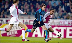 Hernan Crespo battles against the Ajax defence
