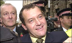 Former butler Paul Burrell leaves outside court after the collapse of his Old Bailey trial