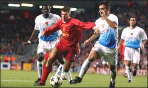 Atouba shadows Liverpool's Steven Gerrard