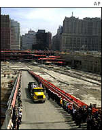 Last steel beam of the World Trade Center is carried away by a lorry 