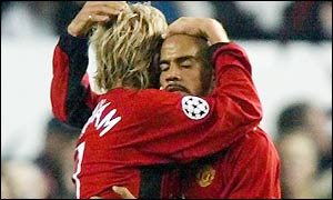 David Beckham congratulates scorer Juan Sebastian Veron