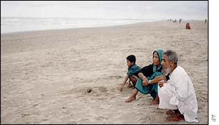 Relatives wait for news of the missing at Cox's Bazar