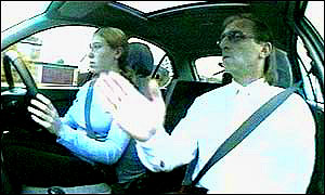 Learner and instructor in car