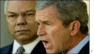 Colin Powell and George Bush