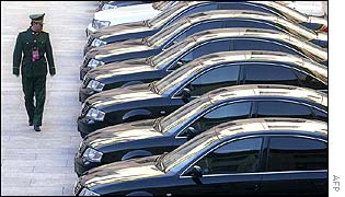 Soldier inspects official cars