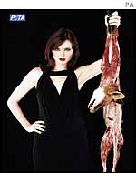Sophie Ellis Bextor holding the bloody carcass of an animal 