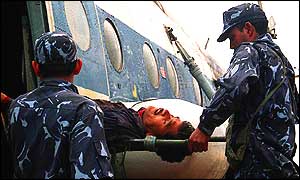 Soldier stretchered onto Nepalese military helicopter