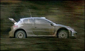 Richard Burns drives through the treacherous conditions during Friday's second stage