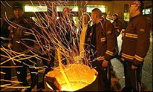 strikers with brazier