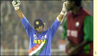 India's Rahul Dravid celebrates his century against the West Indies