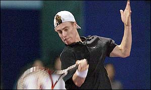 Hewitt finally conquers an exhausted Federer when their epic match ends with Hewitt serving for the match four times