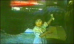 Child in Argentine slum dwelling