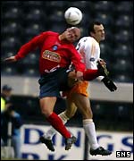 Steve Fulton and Quino contest a high ball