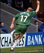 Jim Hamilton wheels away in delight