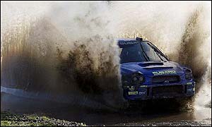 Solberg attempts to shrug off the presence of 2001 rally champion Richard Burns by setting a fast early pace
