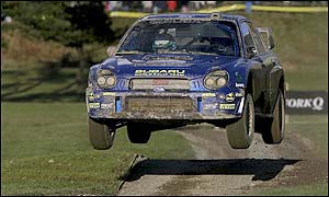 Peter Solberg's Subaru beats the Ford of Markko Martin by 24.4 secs with Carlos Sainz's Focus third