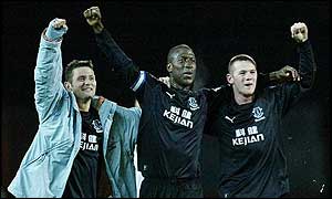 Radzinski, Campbell and Rooney celebrate Everton's win